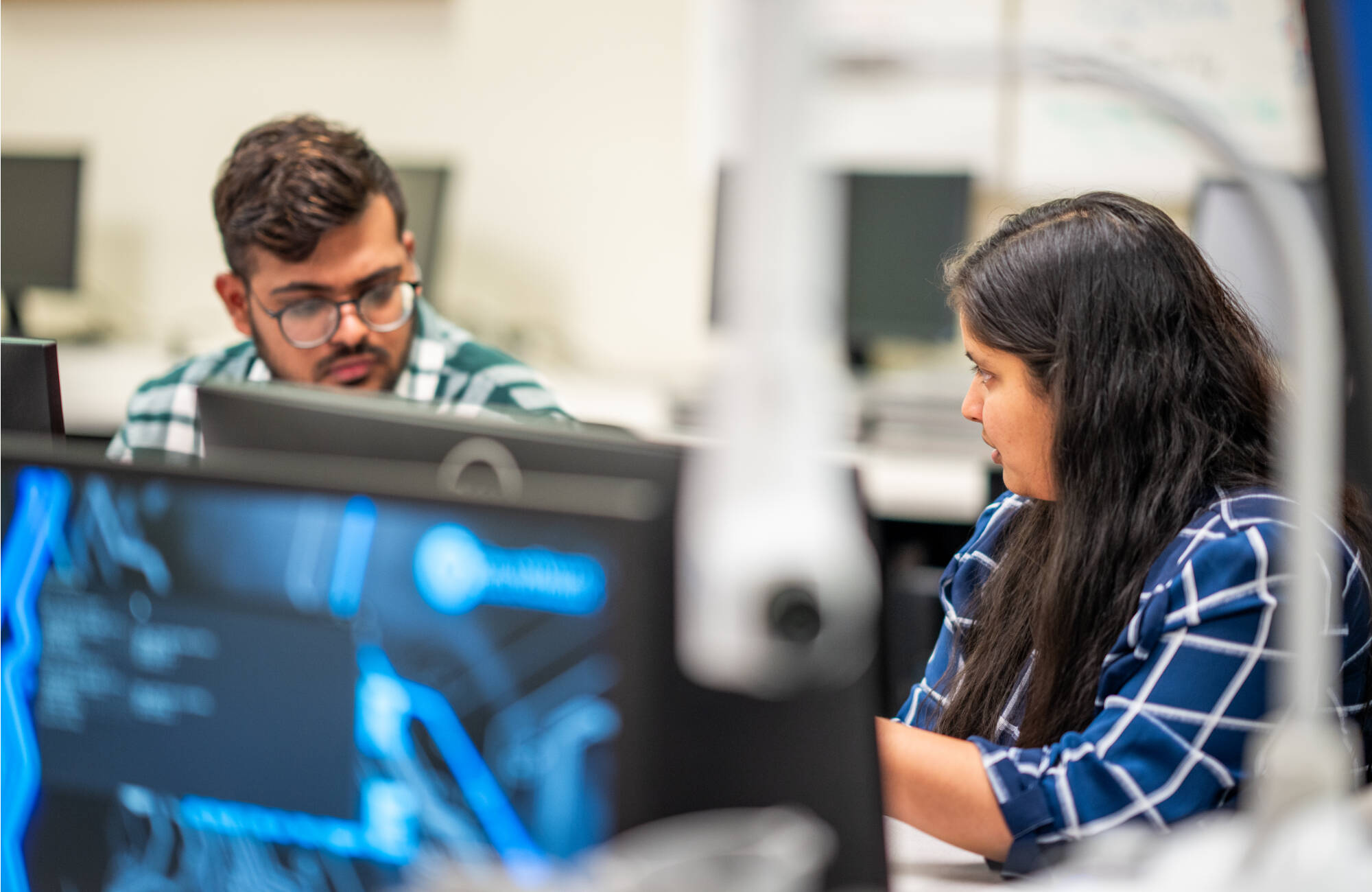 Students work in the Cyber Threat Range